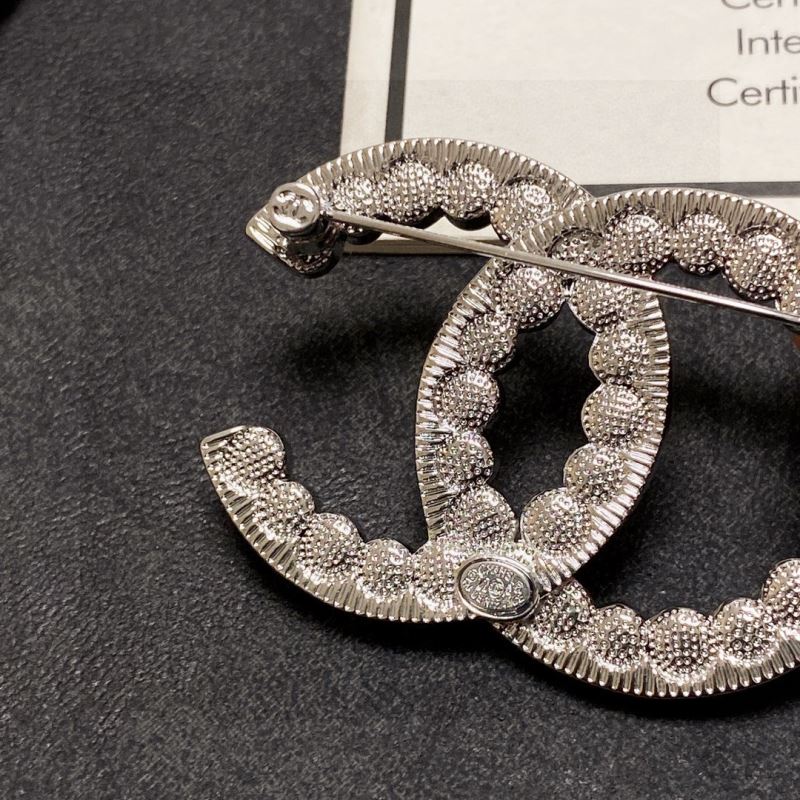 Ch**el brooches